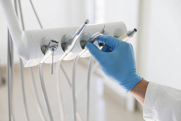 Professional Tooth Extraction technician working in Shark River Hills, NJ